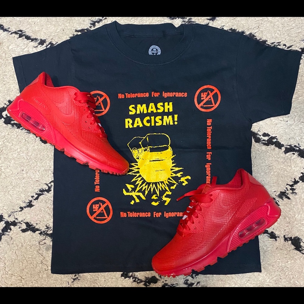 Xs obey “smash racism” T-shirt